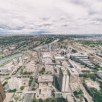 Aerial view of Calgary's East Village beside the Bow River