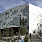 The wooden arched entrance of Calgary's Central Library in East Village